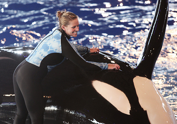 Kyuquot and his trainer at SeaWorld San Antonio, Texas